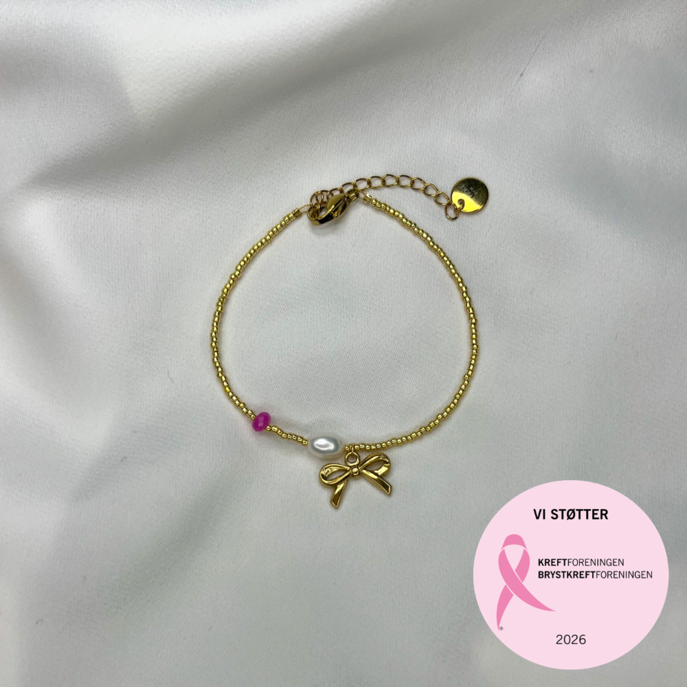 Rosa oktober – Armbånd – Sløyfe, perle og rosa hint