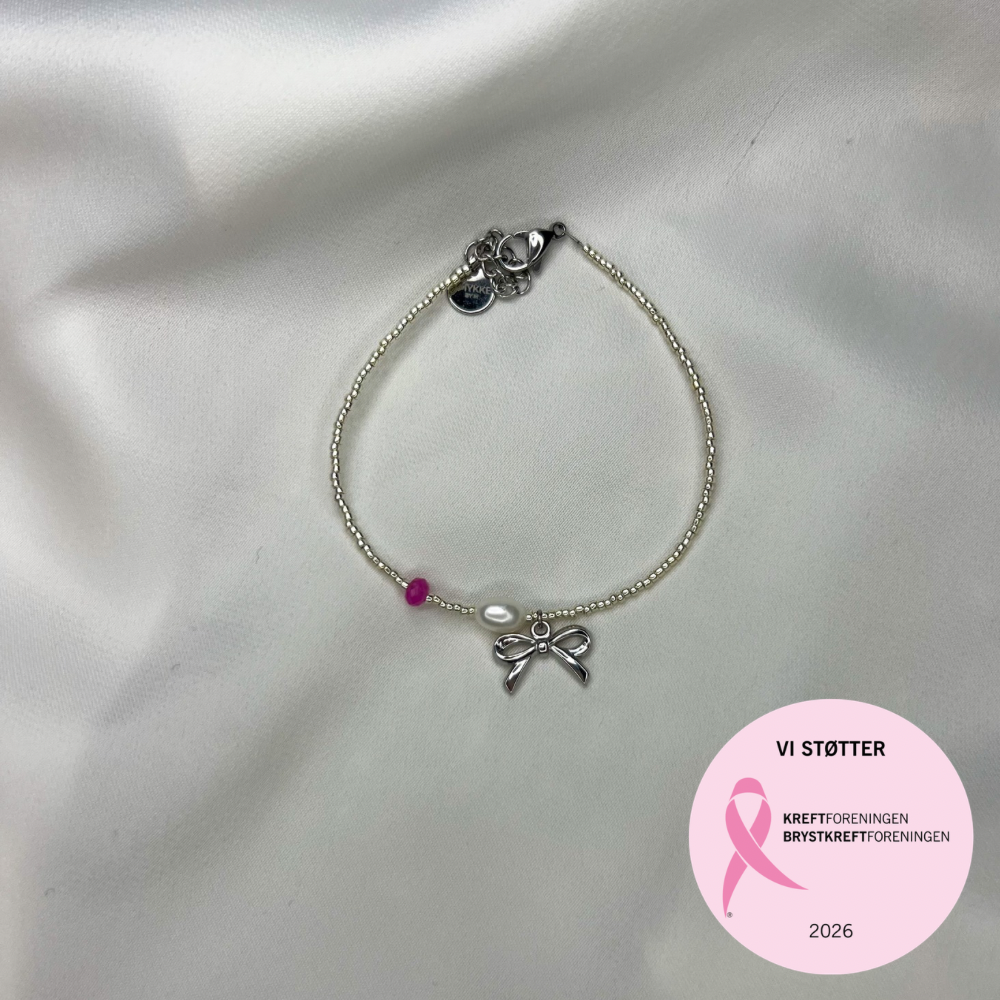 Rosa oktober – Armbånd – Sløyfe, perle og rosa hint