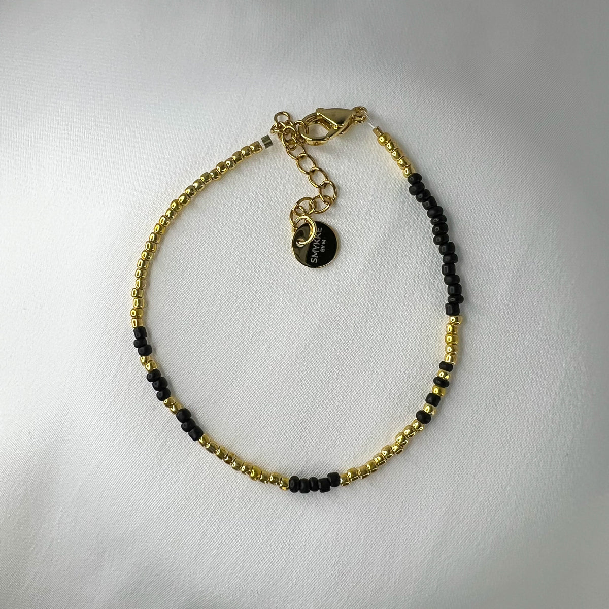 Armbånd Basic i svart og gull